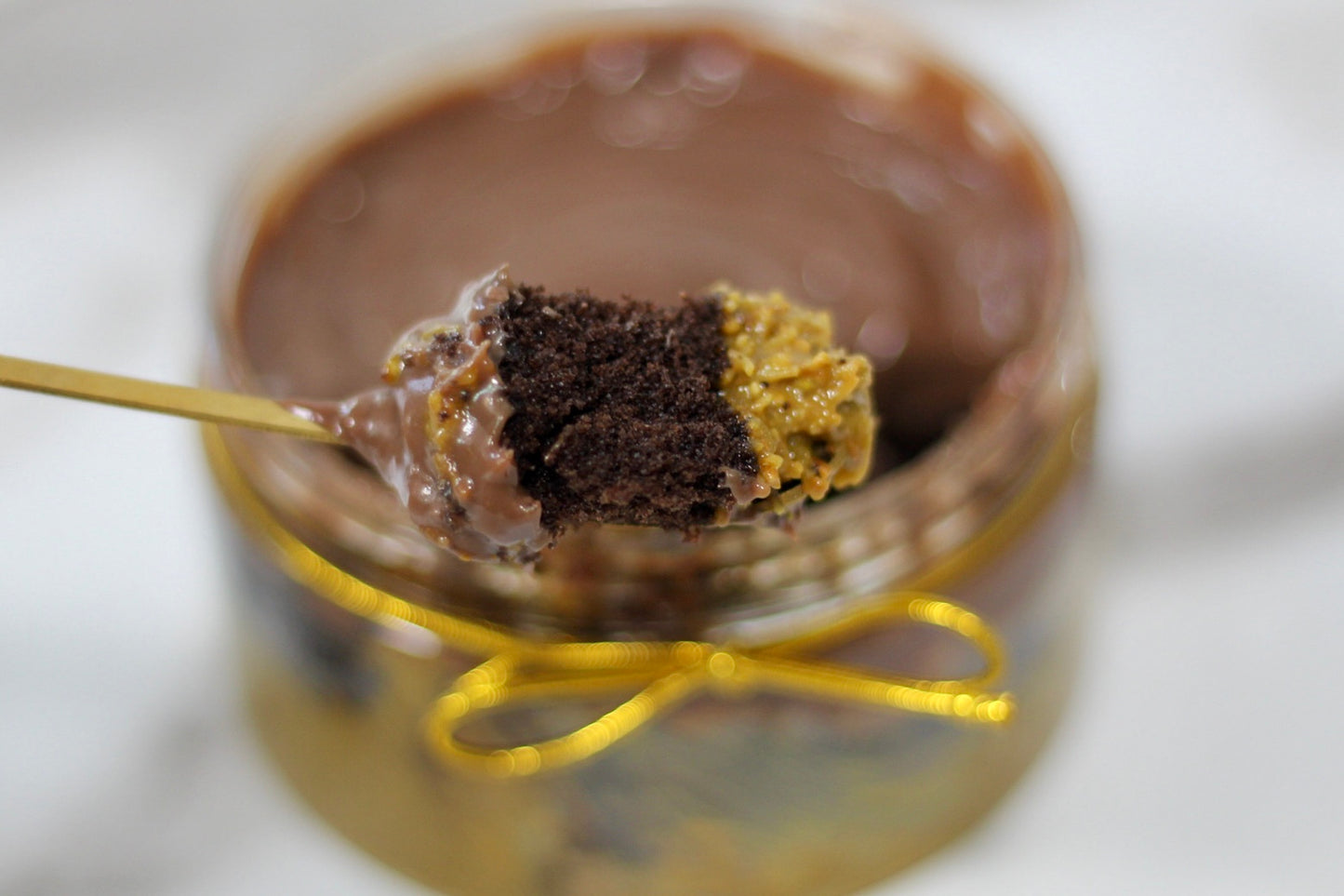 Dubai Chocolate Pistachio Knafeh Cake With Mini Gold Spoon in gift packaging